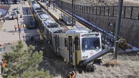RTD W-Line train derails at station in Golden; two people taken to hospital  